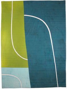 a blue and green rug with white lines on it