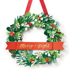 a merry and bright christmas wreath hanging on a wall