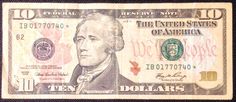 an american ten dollar bill is shown on the website