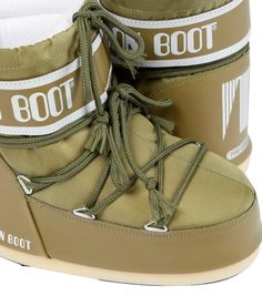 The Icon Low snow boots from Moon Boot Kids are equal parts comfort and style. Featuring foam insulation and a lightweight sole, this iconic brand favorite is updated in khaki green..Closure: lace-up.Lining: fabric.Sole: fabric insole, rubber sole.Toe shape: round toe.Upper: fabric.European sizes.Insole length size 33 = 22cm-8.5'.Insole length size 36 = 22,5cm-88.5'.Size 33 = EU shoe size 33/35.Size 36 = EU shoe size 36/38.Please note that, for a comfortable fit, the shoe should be up to 1.5cm l Moon Boot, Foam Insulation, Moon Boots, Kids Icon, Kids Boots, Khaki Green, Lining Fabric, Snow Boots, Rubber Sole