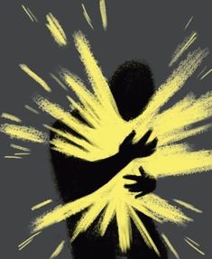 the silhouette of a person with yellow paint splatters all over his body and arms