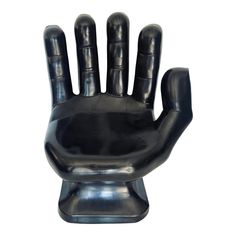 a black hand statue sitting on top of a metal base