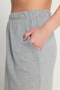 Slay — but feel like you're in sweats. With the cozy-but-dressy Quinn Maxi Skirt, dreams do come true. Whether jet-setting to NYC or heading to dinner with friends, you'll feel like you never left your PJs. Extended side slits Lounge-like relaxed fit Encased elastic waistband Your most versatile skirt, ever Universally flattering midrise | Quinn Maxi Skirt in Heather Ash Relaxed Loungewear Skirt With Elastic Waistband, Knee-length Relaxed Skirt For Loungewear, Relaxed Knee-length Skirt For Loungewear, Knee-length Bottoms With Elastic Waistband For Loungewear, Knee-length Lounge Bottoms With Pockets, Casual Knee-length Loungewear Bottoms, Casual Loungewear Skirt With Pockets, Casual Cotton Skirt For Loungewear, Casual Fall Loungewear Skirt