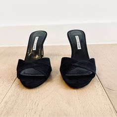 Nwt, Never Been Worn. Comes With Dustbag And Box. Crafted Of Suede, Manolo Blahnik's Siemu Sandals Feature A Crossed-Strap Upper And A 70mm Kitten Heel. Suede Upper Open Toe Slides On Leather Sole Made In Italy Size Kitten Heel. Color: Black. Size: 38 (7.5) Heel Height: 70mm (Kitten Heel) Material: Suede Upper, Leather Sole Design: Crossed-Strap Upper, Open Toe Made In Italy Brand: Manolo Blahnik Color: Black Manolo Blahnik Black, Kitten Heel Sandals, Blahnik Shoes, Manolo Blahnik Shoes, Kitten Heel, Cross Straps, Manolo Blahnik, Open Toe, Kitten Heels