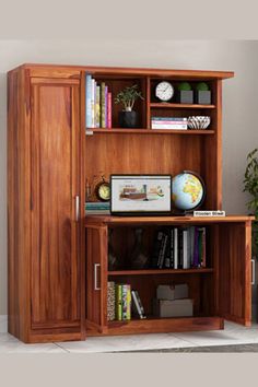 a wooden bookcase with two doors and shelves