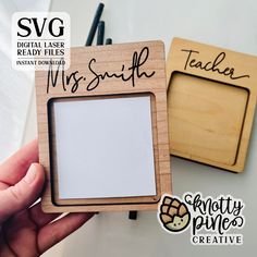 two wooden frames with writing on them, one is for a teacher and the other is for a student