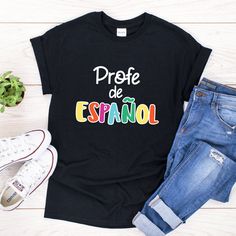 Profe de Español/ Spanish teacher shirt/ colorful spanish teacher t-shirt/ gift for spanish teacher tee If you're looking for a fun and cute design for a Spanish teacher or any other language teacher then this cute profe de español t-shirt is perfect for you. You've now found the staple t-shirt of your wardrobe. It's made of a thicker, heavier cotton, but it's still soft and comfy. And the double stitching on the neckline and sleeves add more durability to what is sure to be a favorite! * 100% r End Of School Year Gift T-shirt, Casual T-shirt For End Of School Year Gift, Casual T-shirt For Back To School Gift, Shirts Diy, Dual Language, Spanish Teacher, Language Teacher, Teacher Tees, Spanish Class