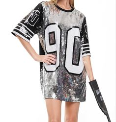 Game Day Black/White 90 sequin t-shirt dress jersey Silver/Black 90 sequin t-shirt dress jersey One Size  Fits Small-Large  some XL  Has Stretch  Depending on body type, body length, or leg length you may have to  wear it as a Oversized Top over leggings and/or shorts. Hand wash cold No bleach Hang to dry Sequin T Shirt Dress, Sequin Jersey, Oversized Top, Jersey Dress, Everyday Style, Dress Clothes For Women, Game Day, T Shirt Dress, Everyday Fashion