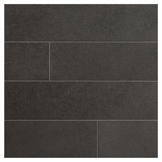 a black tile wall that is very dark gray and has some white lines on it