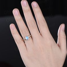 This is a natural moonstone engagement ring in solid gold,about 7mm round rose cut. The accent stones are diamonds or moissanites.The matching band stones are round diamonds or moissanites.The band width about 1.4mm. Moonstone Engagement Ring Set, Band Necklace, Diamond Stacks, Moonstone Engagement, Moonstone Engagement Ring, Wedding Anniversary Rings, Yellow Wedding, Engagement Ring Set, Matching Band