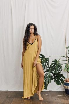 ~Bamboo maxi dress in Yellow~~ Size uk 8-12 ~~Open slits on each side ~~Pockets~~Hand done block print on the reverse ~~ Models hight is 5'6" ~🙏 Caring 🙏Raw Cottons, Linens and Earth Friendly fabrics  are best washed by hand or cold cycle with an ecological detergent .*FIND US *You can find us on other platforms for more photos, updates  and for sharing our journey…Instagram----- @Inka.FreeFacebook----  https://www.facebook.com/INKA.FREE Spring Loungewear Floor-length Dress, Beach Cover-up Maxi Dress With Side Slits, Spring Floor-length Loungewear Dress, Floor-length Spring Loungewear Dress, Maxi Dress With Side Slits For Beach Cover-up, Long Midi Dress With Side Slits For Beach, Summer Dresses With Side Slits For Loungewear, Maxi Length Beach Cover-up Dress With Side Slits, Maxi Length Dresses With Side Slits For Beach Cover-up