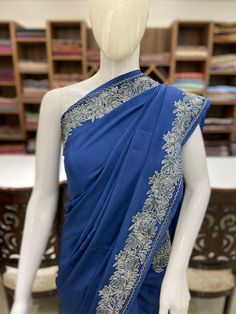 A Marvellous Embroidered Kashmiri Saree which you can wear at any party or a wedding. - - - - - - - - - - - - - - - - - - - -  Product Details - Condition: Brand New (made to order) - Style: Saree Dress - Embroidery: Kashmiri Aari and Tilla Embroidery - Base Colour: Blue or Maroon - Care Instructions: Dry Clean Only F A B R I C Saree: Indian Crepe  Blouse: Indian Crepe F I N I S H - Unstitched You can get it stitched locally. - Stitched Want your blouse ready to wear, let us know the style you want and we will stitch it for you. PLEASE NOTE: We would require you to share certain precise body measurements to stitch the blouse.  If you require guidance on how to take your measurements, please drop us a message. - Blouses are not made to US/UK/EU sizing charts, they are made by measurement. - Elegant Jamawar Saree With Chikankari Embroidery, Elegant Saree With Resham Embroidery In Jamawar, Pre-draped Slub Silk Saree With Embroidered Border, Festive Jamawar Embroidered Fabric For Reception, Traditional Slub Silk Saree With Embroidered Border, Anarkali Jamawar Embroidered Fabric With Cutdana, Wedding Chikankari Embroidery Blouse Piece In Raw Silk, Wedding Chikankari Embroidery Raw Silk Blouse Piece, Navratri Raw Silk Saree With Chikankari Embroidery