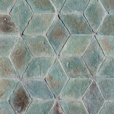 a close up view of a tile wall