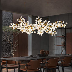 a large chandelier hanging over a dining room table