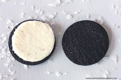 an oreo cookie is sitting next to another one