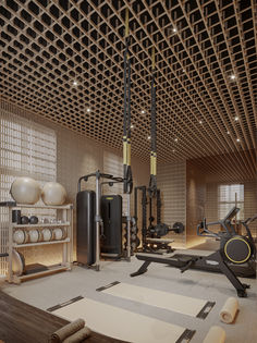 a gym with exercise equipment and yoga mats