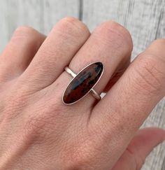 Oval Mahogany Obsidian Brown Sterling Silver Ring | Black and Brown Stone Ring by GildedBug on Etsy Minimalist Brown Sterling Silver Jewelry, Sterling Silver Brown Rings With Polished Finish, Brown Sterling Silver Rings With Polished Finish, Sterling Silver Rings With Brown Polished Finish, Minimalist Brown Jewelry With Natural Stones, Minimalist Brown Rings For Gifts, Everyday Brown Sterling Silver Jewelry, Brown Sterling Silver Rings With Natural Stones, Sterling Silver Rings With Brown Natural Stones