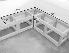 the measurements for a bench made out of wooden planks are shown in black and white