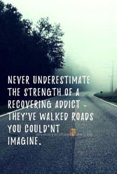 an empty road with the words never underestimate the strength of a recovering adult - they've walked roads you couldn't imagine