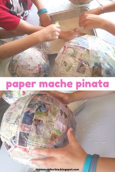 paper mache pinata is being made with newspaper and plastic wrap around the globe