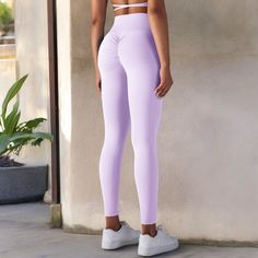 The Anna-Kaci Women's Overlap V-Waist Pocket Solid Color Leggings are the perfect blend of comfort, style, and functionality. Made from soft, stretchy fabric, these leggings feature a unique overlap V-waist design that provides a flattering and secure fit. The solid color makes them versatile for pairing with any top, while the convenient side pockets add a practical touch for carrying small essentials. Whether you're heading to the gym, running errands, or lounging at home, these leggings offer Fitted Solid Leggings For Gym, Solid Color Fitted Leggings For Gym, Fitted Solid Color Leggings For Gym, High Waist Fitted Yoga Pants For Light Exercise, Fitted High Waist Yoga Pants For Light Exercise, Fitted Solid Color Activewear For Workout, Fitted Solid Color Activewear, Fitted Breathable Purple Yoga Pants, Purple Fitted Yoga Pants For Light Exercise