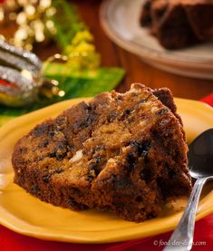 two pieces of chocolate chip cake on a yellow plate