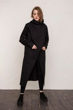 Coat women / Long coat / Jacket / Minimalist / Oversized coat / Asymmetrical coat / Elegant coat /Trench coat / Black coat Composition 80% Wool 20% Polyester Model is 175cm height Size guide XS Bust: 82-85cm, Waist: 62-66cm, Hips: 86-90cm S Bust: 86-89cm, Waist: 66-70cm, Hips: 90-94cm M Bust: 90-93cm, Waist: 70-74cm, Hips: 94-98cm L Bust: 94-97cm, Waist: 74-80cm, Hips: 99-105cm XL Bust: 98-103cm, Waist: 80-86cm, Hips: 106-112cm XS: EU34 / US 2 / UK6 / FR 34 S: EU 36 / US 4 / UK8 / FR 36 M: EU 38 Black Oversized Long Wool Coat, Modern Long Outerwear For Fall, Black Lagenlook Long Outerwear, Black Long Lagenlook Outerwear, Modern Long Sleeve Wool Coat For Fall, Modern Oversized Long Wool Coat, Modern Long Sleeve Wool Coat For Winter, Modern Asymmetrical Outerwear For Fall, Asymmetrical Winter Workwear Outerwear