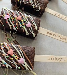 chocolate brownies with sprinkles and hearts on them