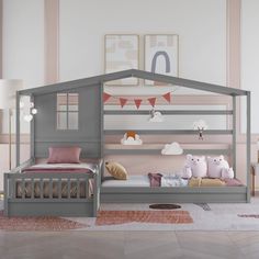 a child's bedroom with bunk beds and pink rugs on the floor in front of it