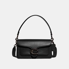 A modern take on an archival 1970s Coach design our structured Tabby shoulder bag is crafted of polished pebble leather. Finished with our Signature hardware for an iconic touch the compact 26 features two detachable straps to carry by hand style as a short shoulder bag or wear crossbody. | Coach Tabby Shoulder Bag 26 - Women's - Pewter/black Vintage Coach Purse, Coach Tabby, Trendy Purses, Aesthetic Bags, Polished Pebble, Coach Shoulder Bag, Signature Hardware, Vintage Coach, Fashion Updates