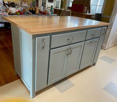 a kitchen island in the middle of a room