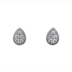 Petit Pear Shaped Earrings w/ Diamonds 14K White Gold These modern cluster earrings feature .48 carats of diamonds and are finished in 14 karat white gold. The clusters are pear shaped with smaller diamonds outlining the border and larger stones in the center. These would be great for everyday wear and fancy evening wear as well! Primary Stone: Genuine Natural Diamond Shape and Measurements: 1.15 mm = .006 ct(70) Color: G/H Clarity: VS2 / SI1 Stone Weight: .48 ct General Characteristics: Measure Dazzling Cluster Diamond Earrings For Formal Occasions, Dazzling Cluster Diamond Earrings For Formal Events, Formal Cluster Earrings With Diamond Accents, Formal Pear-shaped Brilliant Cut Cluster Earrings, Elegant Halo Setting Cluster Earrings, Formal Diamond White Cluster Earrings, Platinum Cluster Diamond Earrings For Formal Occasions, Formal Cluster Halo Setting Earrings, Classic Cubic Zirconia Cluster Earrings