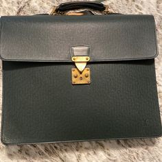 Beautiful Piece. I Don’t Use The Bag And She Deserves Someone Who Will Take Her Out! Has Visible Signs Of Wear On Inside And Outside Of Bag. Lock Works. Comes With 2 Keys. Includes An Unbranded Black Strap. Can Easily Be Removed. Classic Green Satchel With Branded Hardware, Formal Shoulder Bag Briefcase, Luxury Green Satchel For Business, Green Luxury Satchel For Business, Designer Green Business Bag, Green Business Satchel With Gold-tone Hardware, Classic Green Business Bag, Designer Green Shoulder Bag For Business, Business Trip Satchel With Gold-tone Hardware