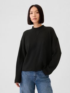 Soft, stretch waffle-knit over Oversized Knit Turtleneck Top, Oversized Knit Top With Funnel Neck, Gap Crew Neck Tops For Fall, Gap Relaxed Fit Tops For Fall, Trendy Oversized Tops With Ribbed Collar, Trendy Oversized Top With Ribbed Collar, Solid Color Ribbed Funnel Neck Tops, Ribbed Neckline Knit Turtleneck Tops, Knit Turtleneck Top With Ribbed Neckline