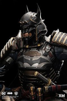 the dark knight batman statue is shown in full armor