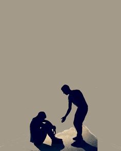 two people are sitting on the ground in silhouette