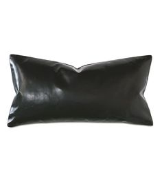 a black leather pillow on a white background