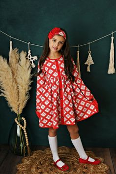 Swoon Baby Winter Floral Prim Pocket Dress Style 21-62 (Dress only). Headband & knee high socks sold separately. We do not offer these accessories in our shop. Ready to ship! This beautiful dress is made of high quality knit fabric. Swoon Baby knits are extremely soft and comfortable. This dress pairs perfectly with knee high socks. Sizing: Swoon Baby fits true to size and the tunics have extra length for longer wear. If you have any questions or need a measurement please contact our shop at 214 Cute Long Sleeve Holiday Dress For Festive Occasion, Cute Long Sleeve Festive Holiday Dress, Playful Long Sleeve Christmas Dress, Cute Long Sleeve Christmas Holiday Dress, White Holiday Dress For Spring, Long Sleeve Holiday Dress For Spring, Playful Red Long Sleeve Dresses, Cute Long Sleeve Holiday Dress, Playful Cotton Winter Dress