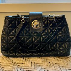 Kate Spade Quilted Whitaker Place Elena Shoulder Bag - 14"W X 9"H - Quilted Pebbled Leather - 14-Karat Gold Plated Turnlock - Interior Slide Pockets - Center Dividing Zipper Compartment Never Used. Like New. Kate Spade Black Shoulder Bag With Top Carry Handle, Kate Spade Black Tote Satchel, Kate Spade Black Leather Satchel, Black Kate Spade Tote Satchel, Black Tote Satchel With Magnetic Closure, Kate Spade Leather Shoulder Bag With Branded Hardware, Kate Spade Black Top Handle Shoulder Bag, Kate Spade Black Top Handle Satchel, Kate Spade Black Satchel For Everyday Use