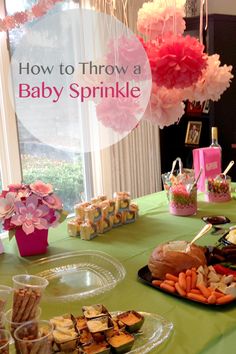 a baby sprinkle party with food and decorations