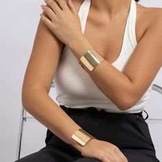 Description:Geometric Gold Silver Tone Mirror Wrist Cuff Wrap Wide BangleSpecification:Size: Dia 2.5"Weight: 1.75 oz/pcsMaterial: Alloy MetalColor: Gold/SilverFeatures & Details:The price quoted is for one piece of bold cuff bracelet only.This geometric mirror oversized cuff bracelet is made of nickel-free. lead-free. cadmium-free and hypoallergenic materials. which will not turn your skin green or cause anaphylactic reaction.It is easy to match your different outfits and also suitable for any occasions like wedding. banquet. costume party. engaged party. prom. anniversary. holiday. evening party or other social events. where let you look elegant. attractive and fashionable.You can give it directly as a gift to your lover. wife. girlfriend. daughter. and your friends for valentine's day. c Trendy Gold Cuff Bracelet For Fashion, Trendy Metal Cuff Bracelet, Chic Metal Cuff Bracelet, Trendy Cuff Jewelry For Spring, Chic Cuff Bracelets For Spring, Chic Cuff Bracelet For Spring, Gold Rectangular Jewelry For Summer, Rectangular Gold Jewelry For Summer, Rectangular Gold Summer Jewelry