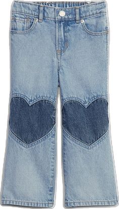 a pair of blue jeans with hearts on the back and side pockets, both in light wash