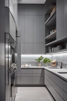 Modern kitchen with sleek grey cabinetry, open shelving, and stainless steel appliances. Small Kitchen Design Apartment