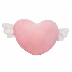 a heart shaped pillow with angel wings on it