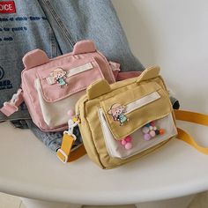 Shipping: Worldwide Express Shipping AvailableDelivery time: 🚚7-15Days Fast ShippingReturns: Fast refund,💯100% Money Back Guarantee.Brand Name: dolobMain Material: nylonInterior: Interior Zipper PocketExterior: Open PocketLining Material: nylonPlace Of Origin: SHAN DONG ProvinceStyle: CasualDecoration: Criss-CrossOrigin: Mainland ChinaCN: ShandongPattern Type: GeometricOccasion: VersatileClosure Type: HaspSize: (20cmPlace Of Origin: China (Mainland)Shape: HobosGender: WOMENHardness: Moderate Small School Bags, Cartoon Canvas, Bag Cartoon, Student Girl, Rabbit Ears, Shoulder Messenger Bag, Girl Backpacks, Square Bag, Cotton Bag