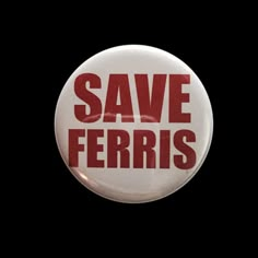 a white button with the words save ferriss printed on it, against a black background