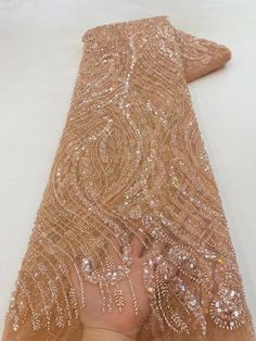 This high quality Fabric is measured in 5 Yards With Embroidered Beading and Sequin. It is soft, very delicate and beautiful. This high Quality Fabric is made with Fashion embroidered rhinestones can be used in making party wedding dresses, skirts, shawls, scarves and other other fashion apparels as you would like. Size : Length : 5 yards (180 inch). Width: 50 inch (Please allow slight deviation for the measurement data ,±1 inch) Material: 100% Polyester, Tulle Lace Fabric, Eco-Friendly embroide Elegant Fitted Gold Tulle Fabric, Fitted Embroidered Fabric With Rhinestones For Evening, Elegant Sparkling Tulle Fabric For Evening, Fitted Embellished Embroidered Fabric For Banquet, Elegant Beaded Tulle Fabric For Weddings, Elegant Sparkling Tulle Fabric For Wedding, Pink Embroidered Fabric With Rhinestones For Wedding, Lace Sequin Fabric With Rhinestones, Elegant Embroidered Sequin Fabric For Banquet