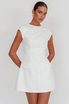 Aristos Cap Sleeve Mini Dress White Chic A-line Mini Dress With Structured Shoulders, Chic A-line Mini Dress With Box Pleat, Modern Fitted A-line Mini Dress, Fitted A-line Mini Dress For Office, Elegant A-line Mini Dress With Structured Shoulders, Chic A-line Fit And Flare Mini Dress, Chic Seamed Midi-length Dress, Chic Midi-length Seamed Dress, Chic Midi Length Seamed Dresses