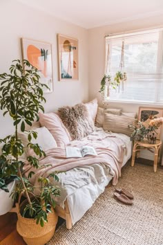 a bedroom with lots of plants in the corner