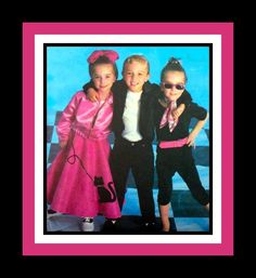 three young children posing for a photo in front of a blue and pink background with the caption's name on it